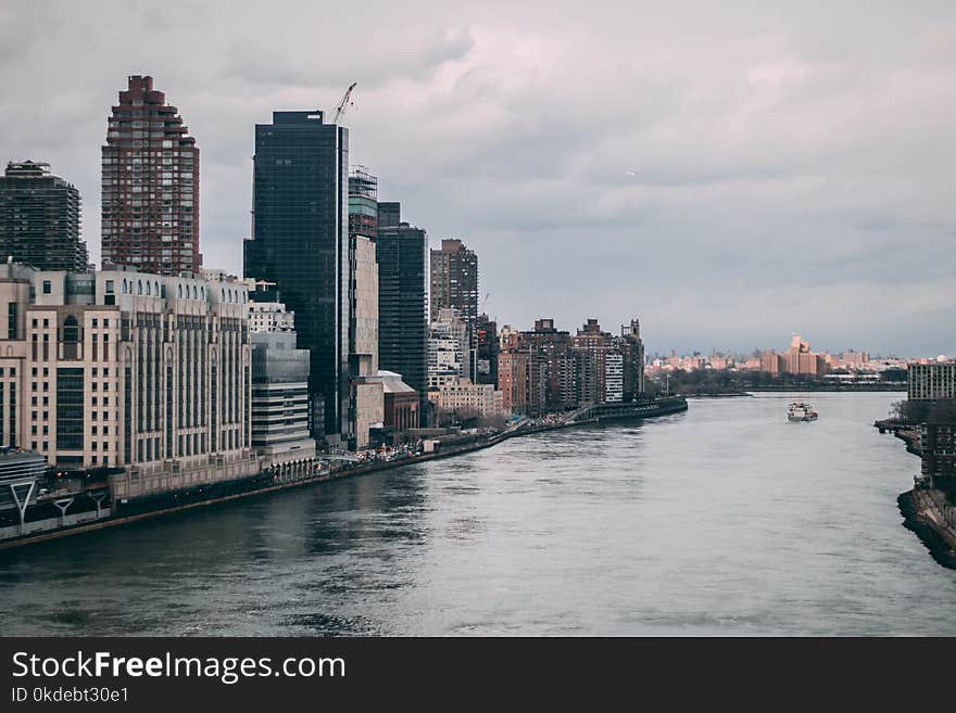 Boat Between Cityscape