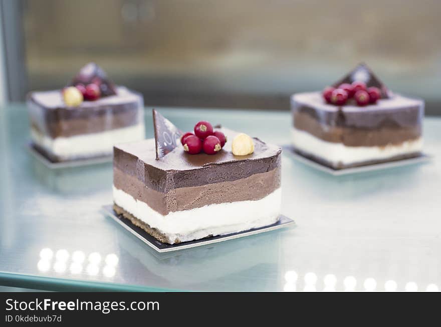 Selective Focus Photo of Sliced Cake on Table