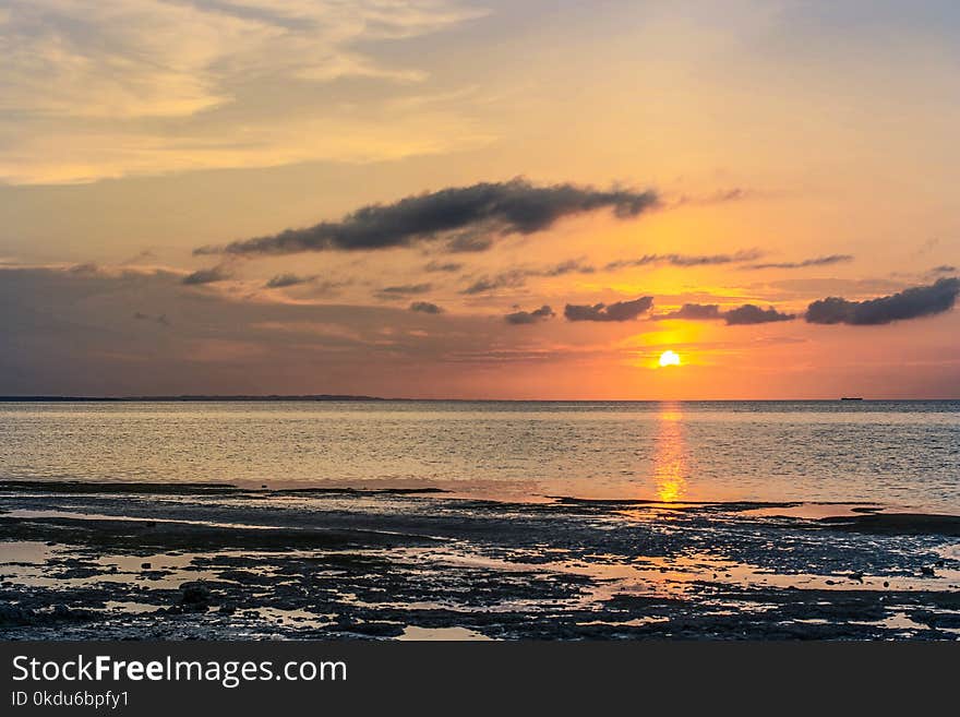 Body of Water during Sunset