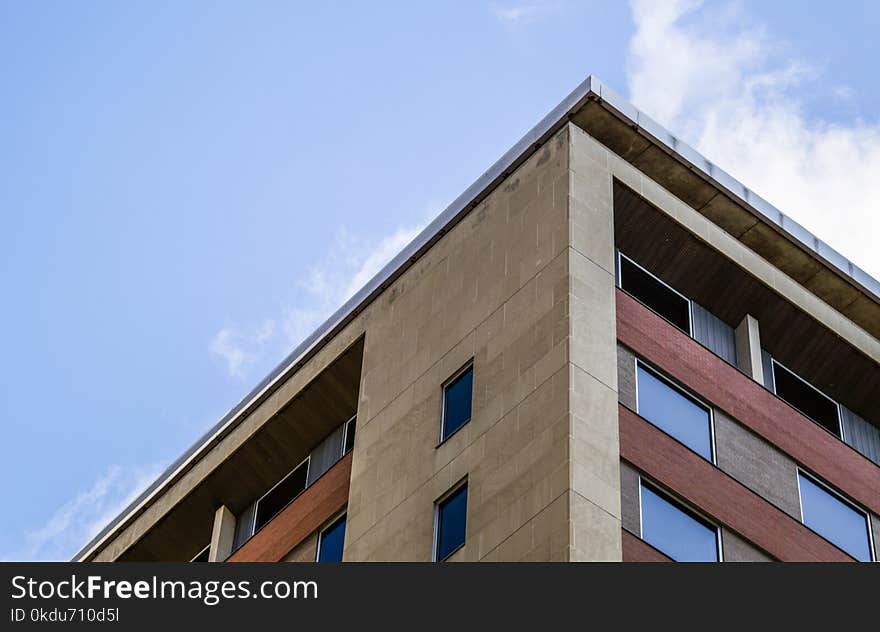 Low Angle Photography of Brown Concrete Building