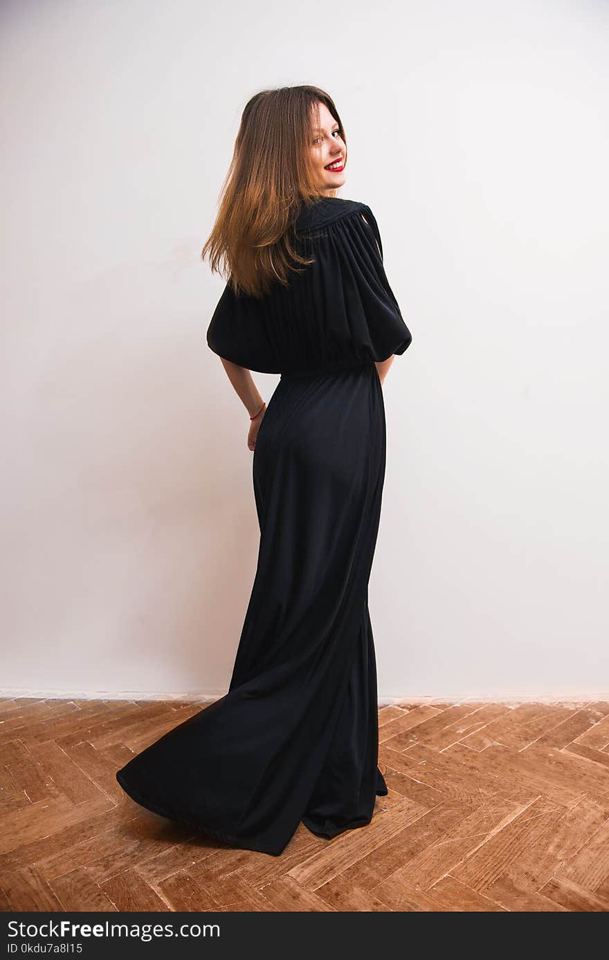 Woman Wearing Black Maxi Dress