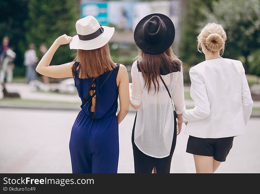 Beautiful young girls outdoors in Sunny weather