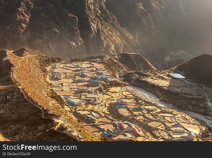 Beautiful mountain village Thame in Sagarmatha national park, Himalayas, Nepal. Idyllic asian village in mountain gorge. Sunrise scenery of mountain village on a beautiful morning. Beautiful mountain village Thame in Sagarmatha national park, Himalayas, Nepal. Idyllic asian village in mountain gorge. Sunrise scenery of mountain village on a beautiful morning.