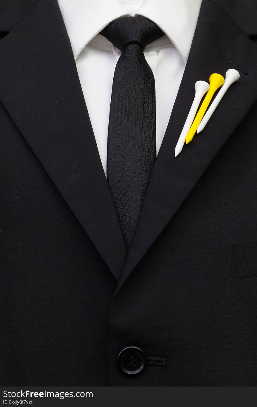 The detail of wedding suit with golf design.