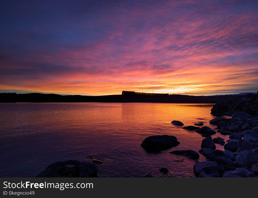 Scenic View of Lake During Dawn