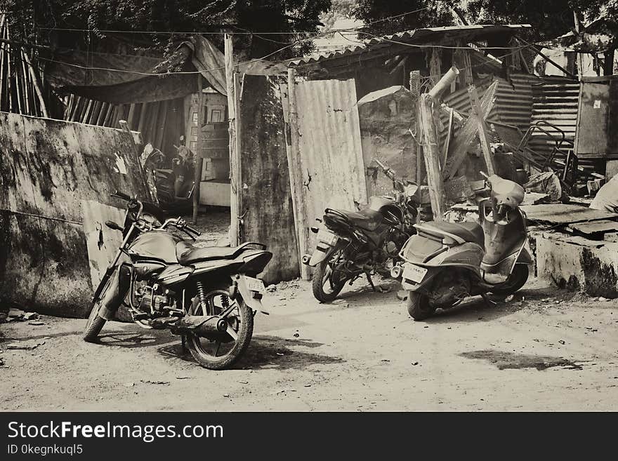 Grayscale Photo of Motorcycles