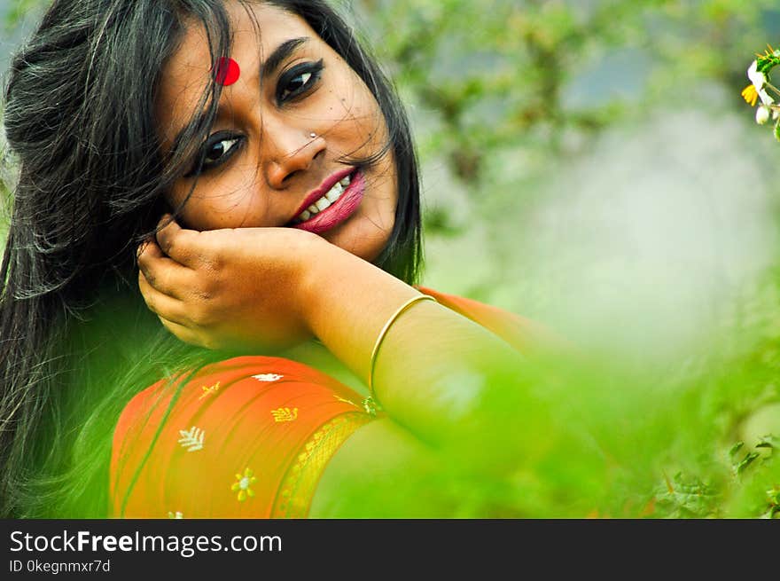 Close-Up Photography of a Smiling Girl