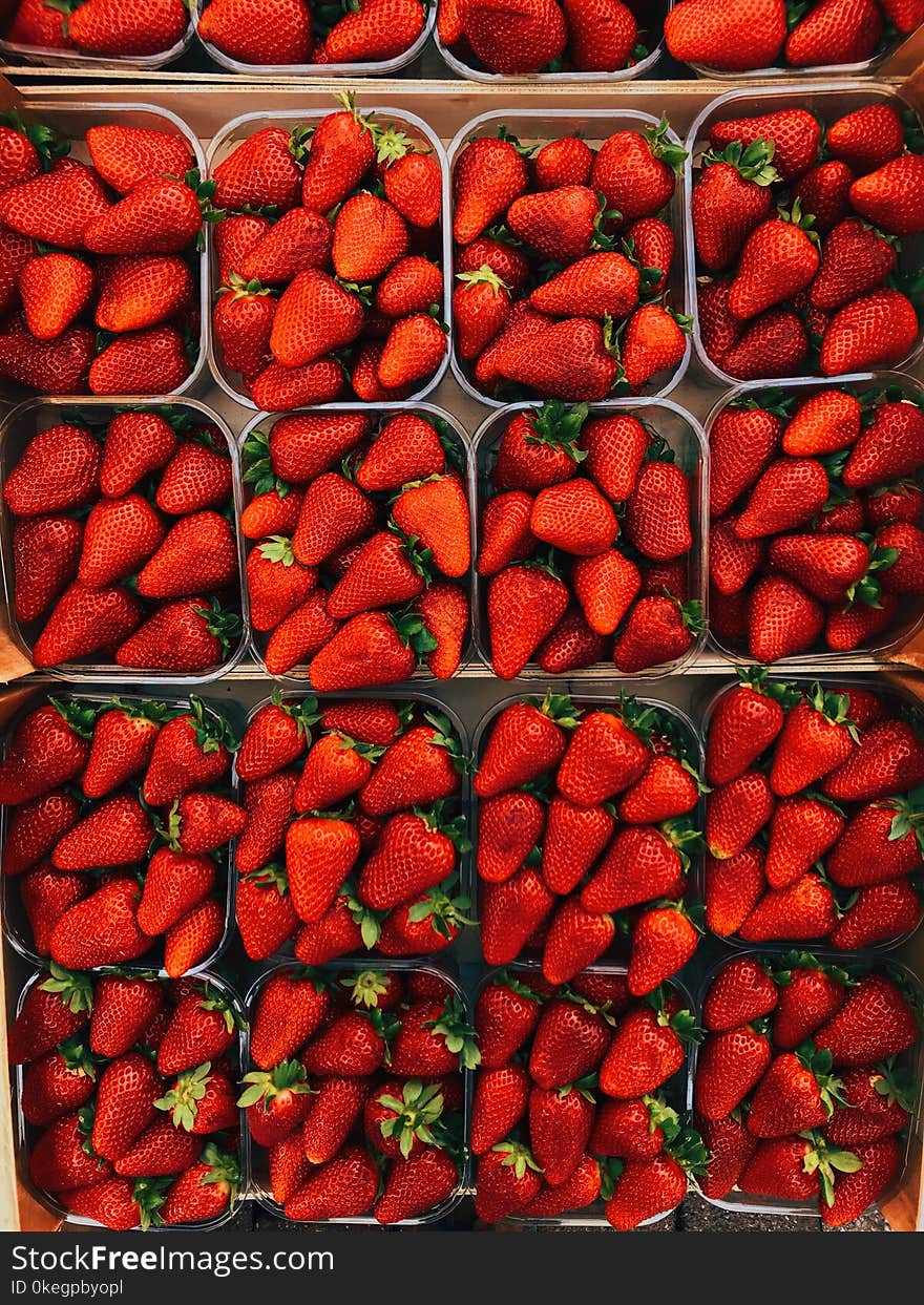 Top View Photography of Strawberries on Containers