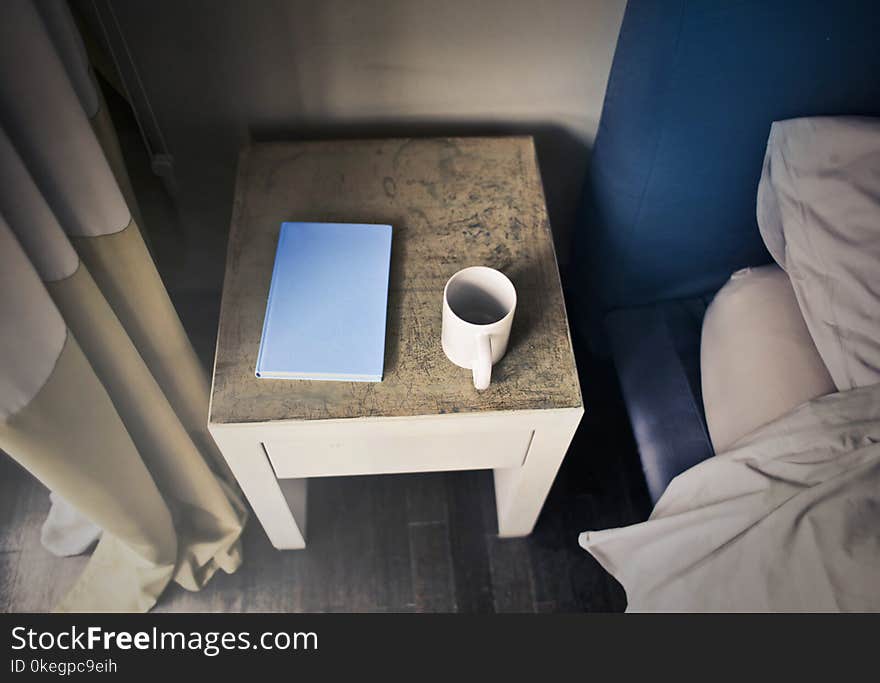 Photography of Side Table Near Bed