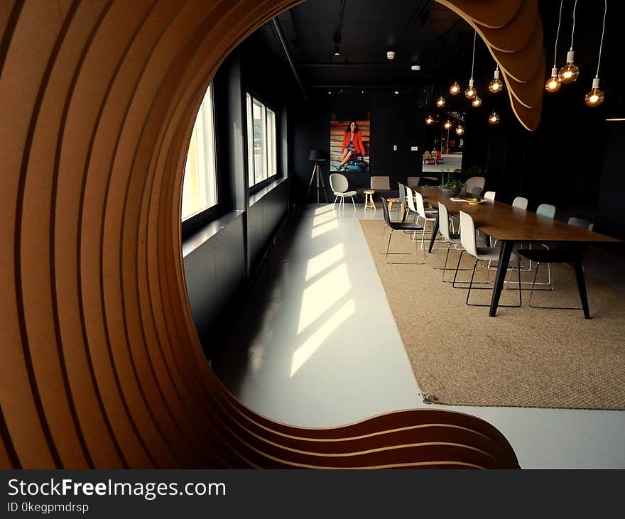 Portrait Photography of Brown Chair Inside a Room