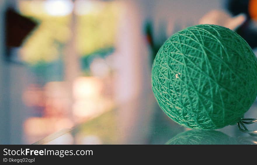 Close-Up Photography of Green Yarn