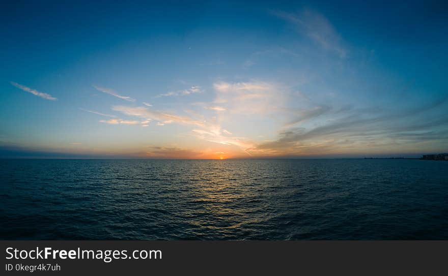 Photo of Body of Water during Golden Hour