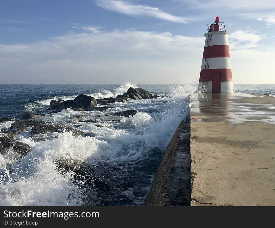 Photo of Red and White Lighthouse