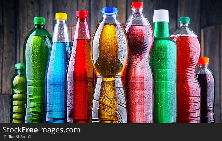 Plastic bottles of assorted carbonated soft drinks