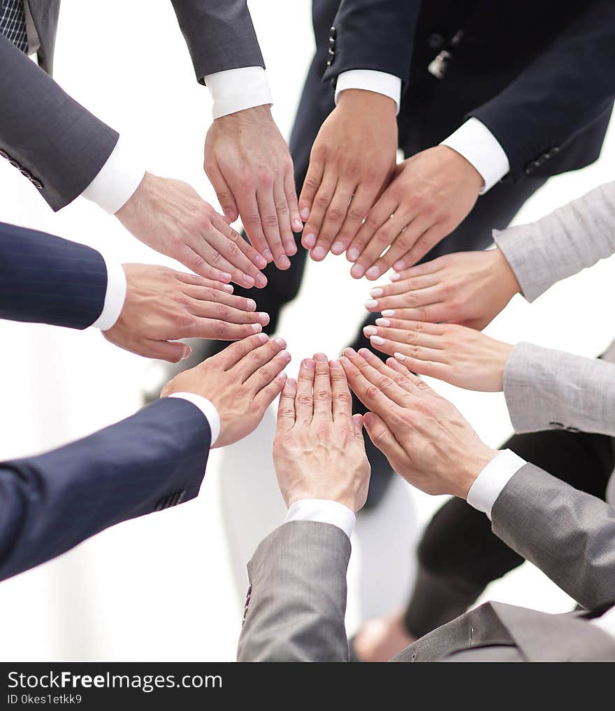 Concept of purpose.closeup. hands business team form a circle