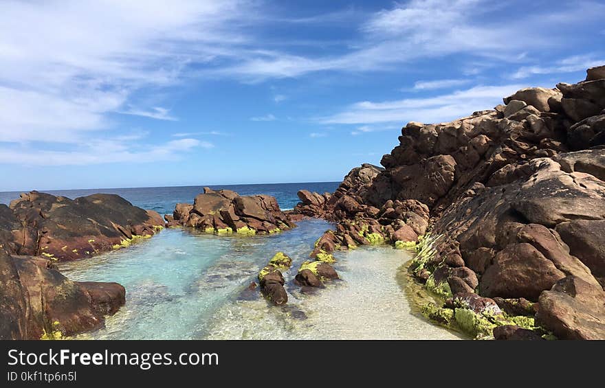 Photo of Stones and Body of Water