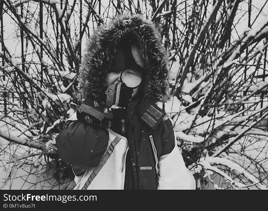 Greyscale Photo of Woman With Snowsuit