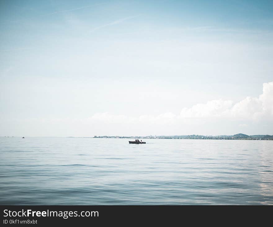 Boat on Calm Body of Water