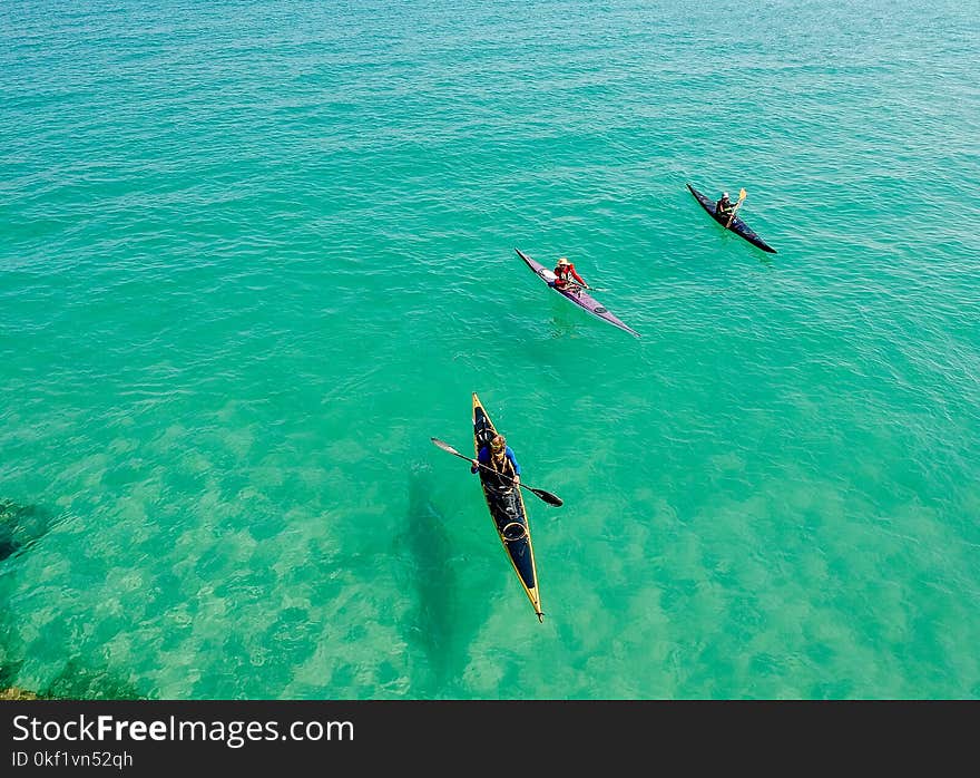 Three Yellow and Pink Kayak