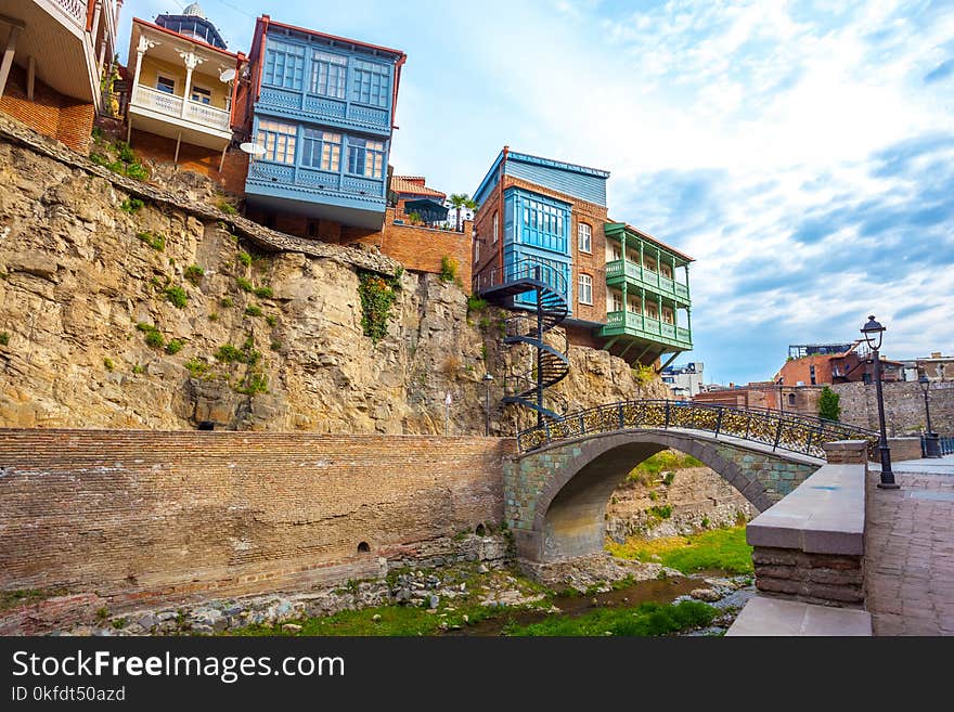 Architecture of the Old Town of Tbilisi, Georgia, in Abanotubani area. Domes of sulfur baths, carved balconies