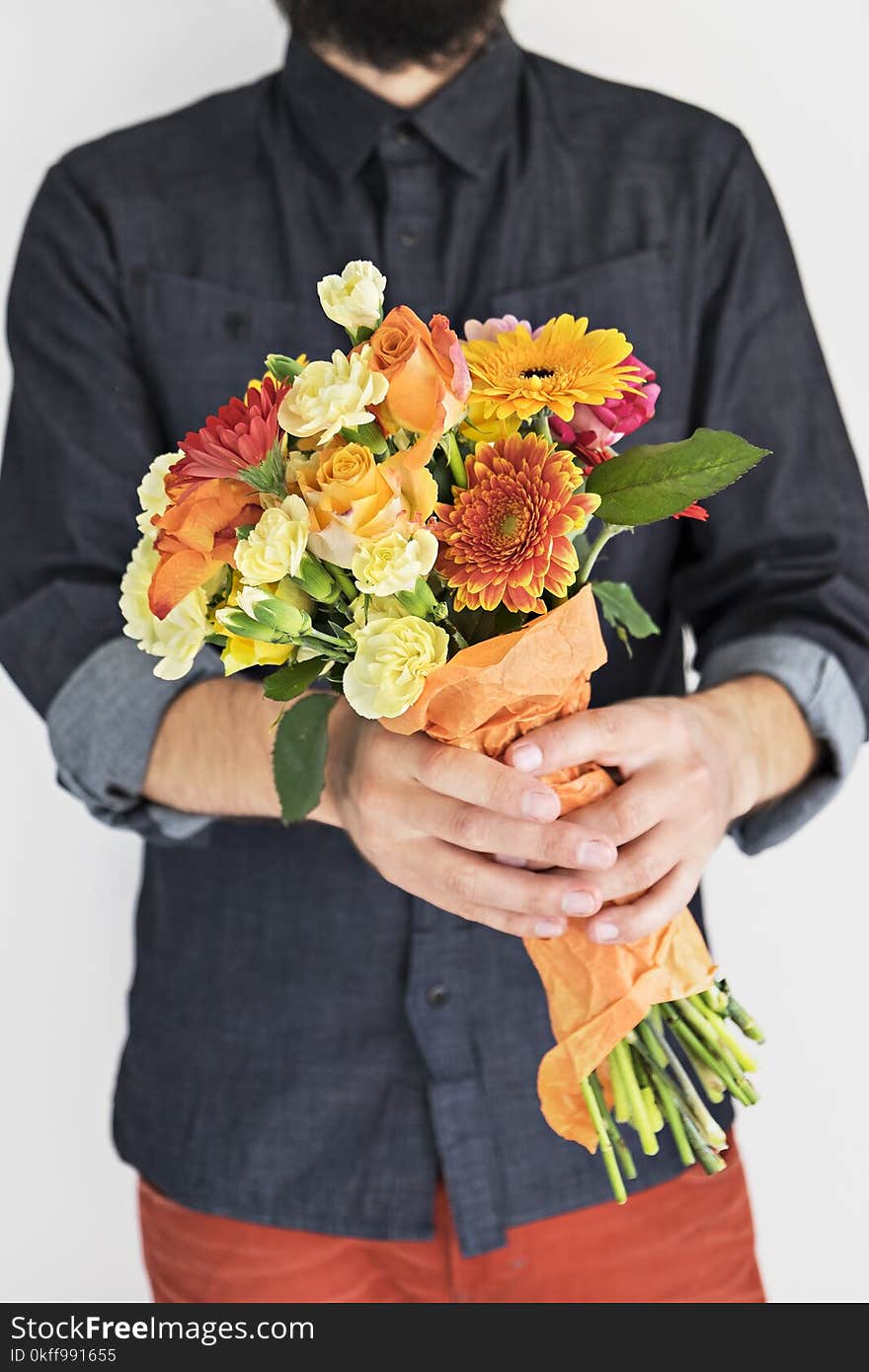 Hipster man with elegant bouquet