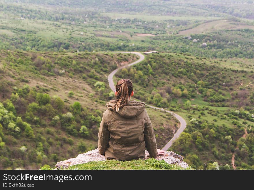 Woman in Brown Hoodie