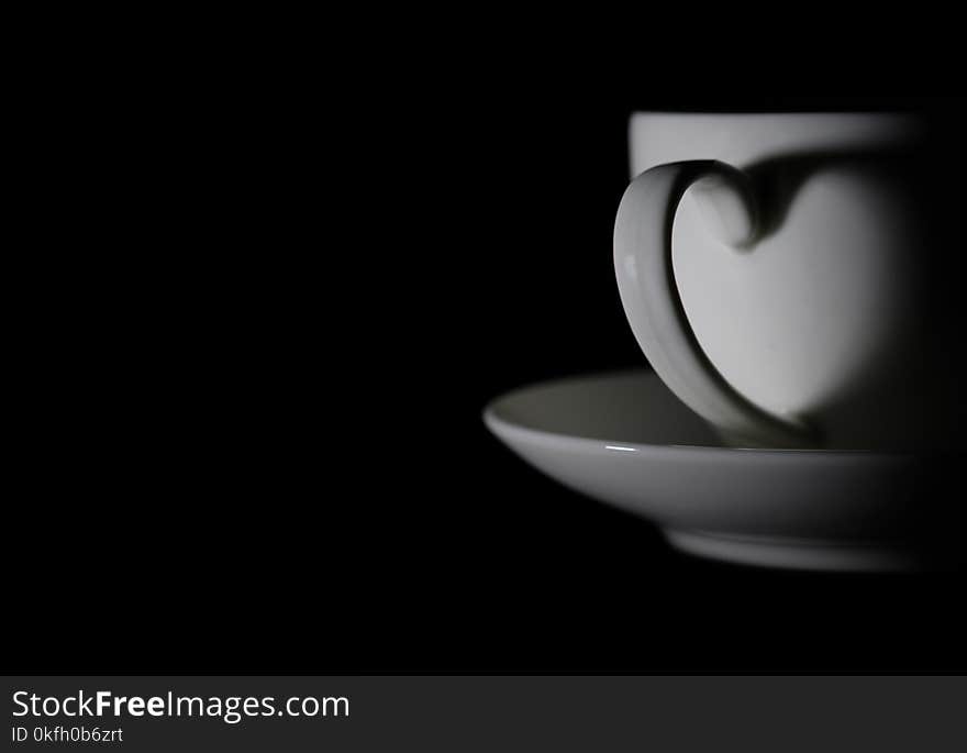 Grayscale Photography of Cup and Saucer