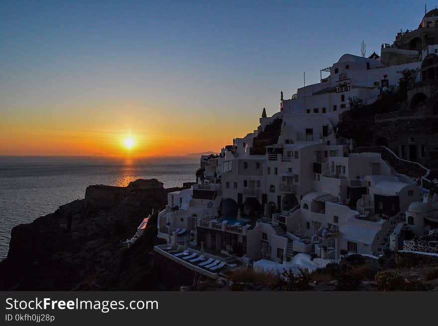 Houses Near the Ocean at Sunset