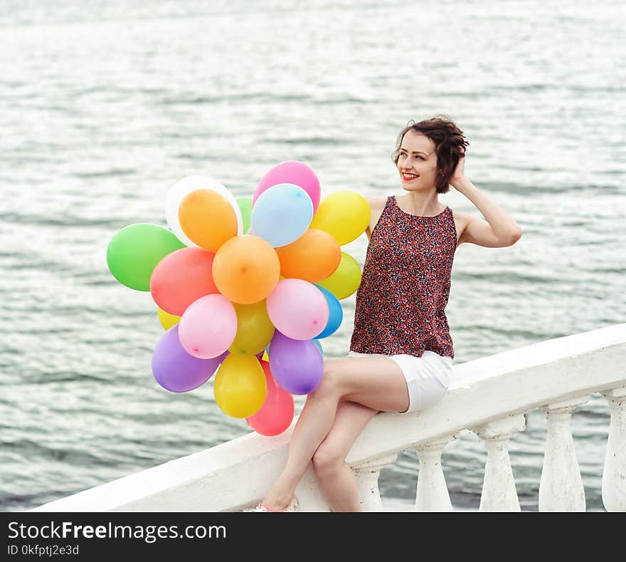 Girl with colorful balloons outdoor. Girl with colorful balloons outdoor