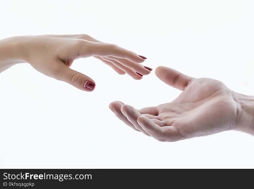 Hand shakes hand in greeting, for background and business