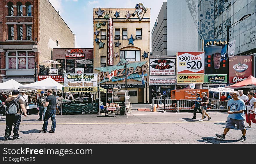 Photo of People at the Street