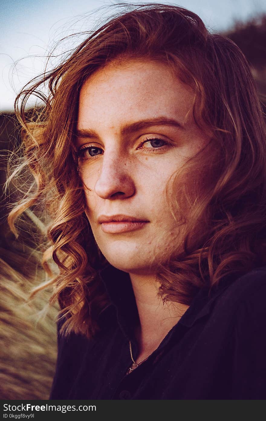 Photo of Woman Wearing Black Collared Top