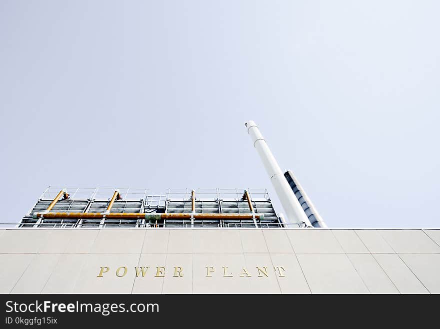 Low Angle Photo of Power Plant Tower