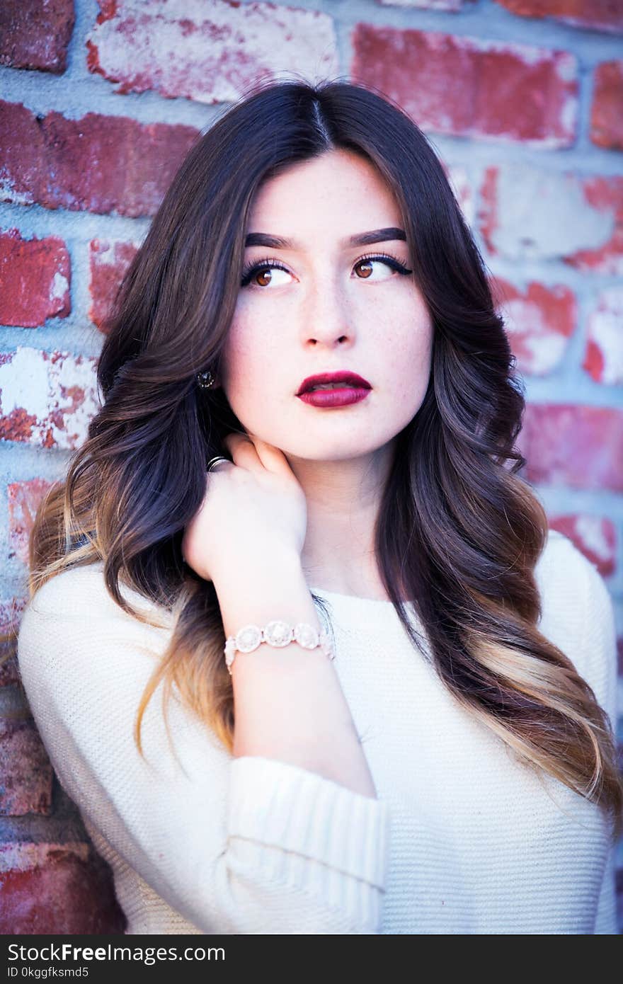 Portrait of Woman Leaning on Wall