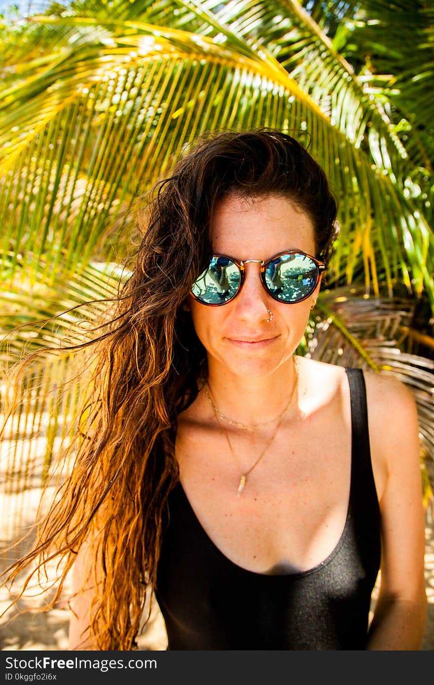 Photography of a Woman Wearing Sunglasses