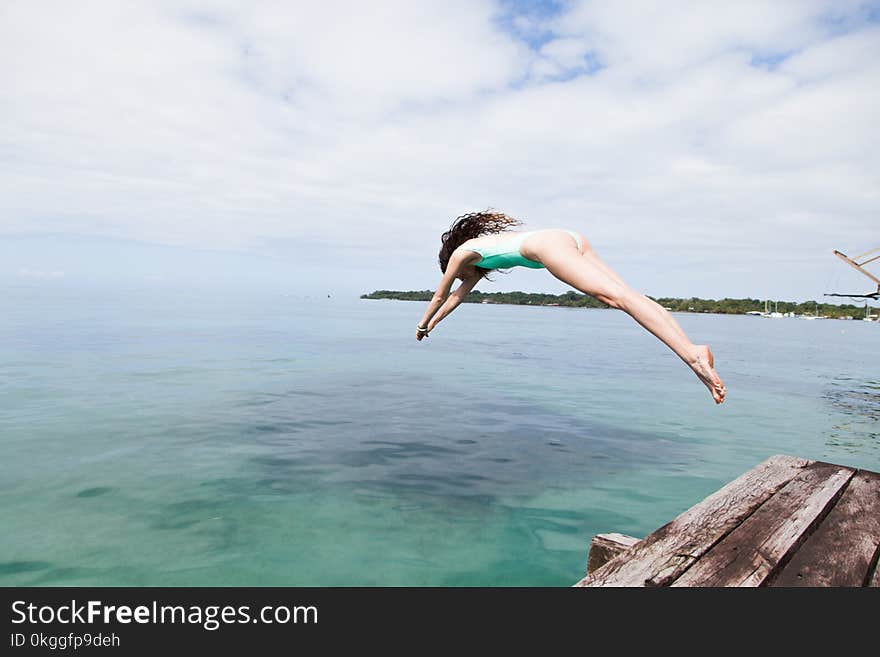 Photo of Woman Diving Into the Water