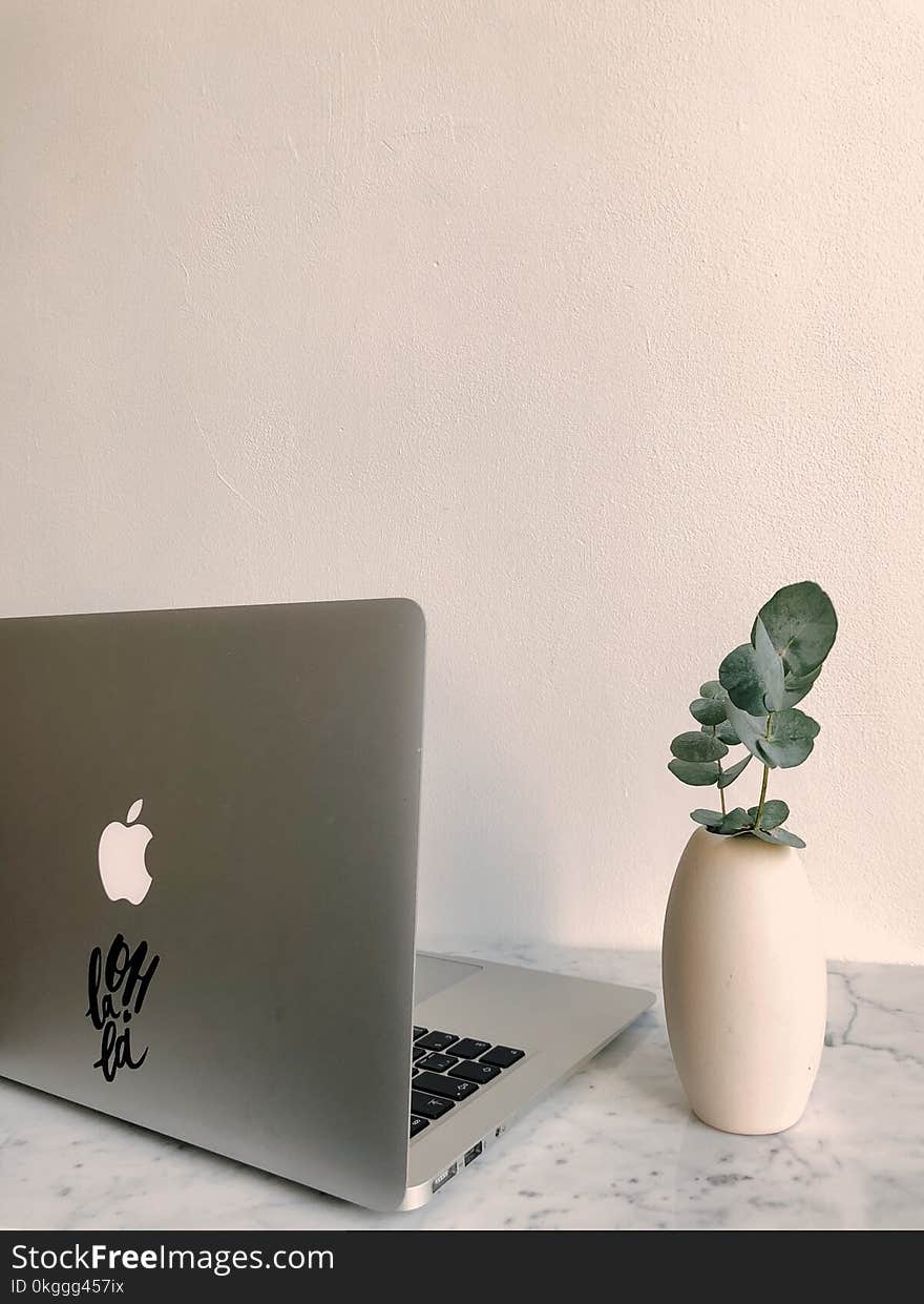 Photo of Macbook on Granite Desk