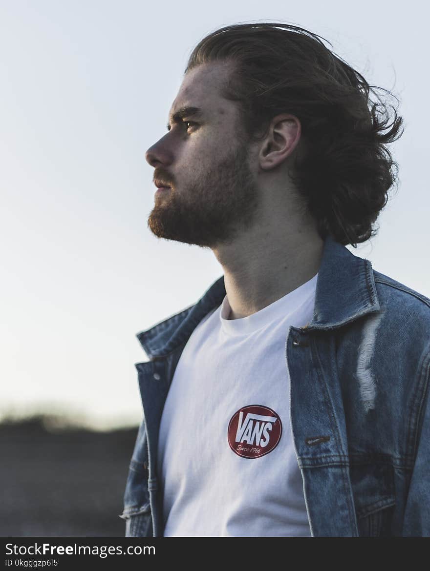 Man Wearing White Crew-neck Vans Top and Blue Denim Button-up Jacket