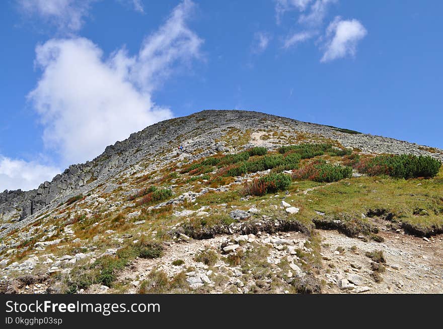 Green Mountain Under Blue Sky