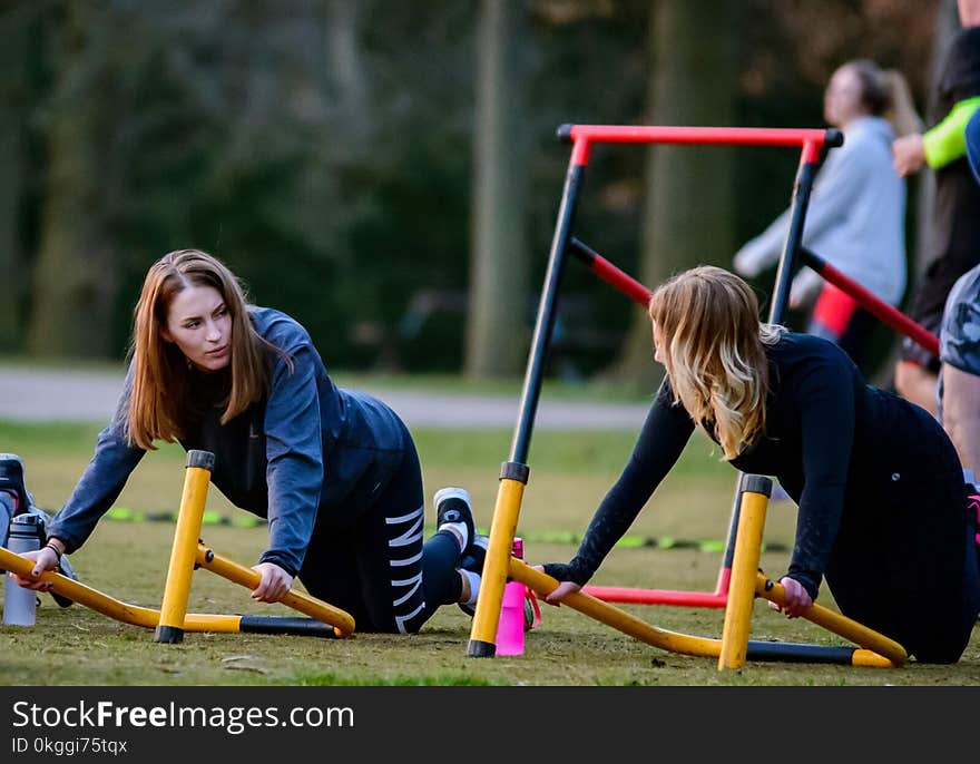 Two Woman Doing Exercise Routine