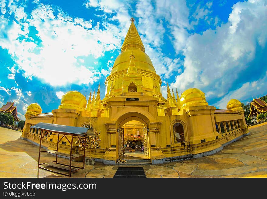 Gold Temple Under Cloudy Sky