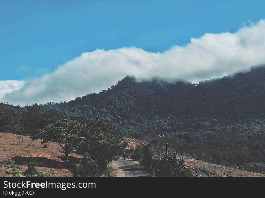 Green Mountain Near White Clouds