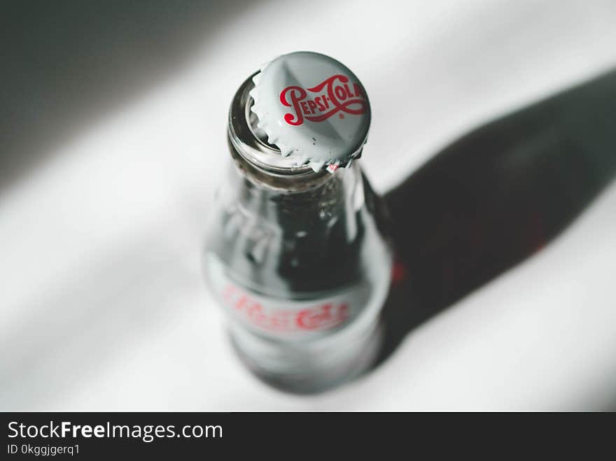 Opened Coca-cola Soda Bottle