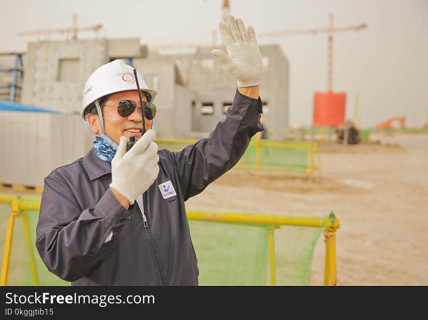 Man Holding Walkie Talkie