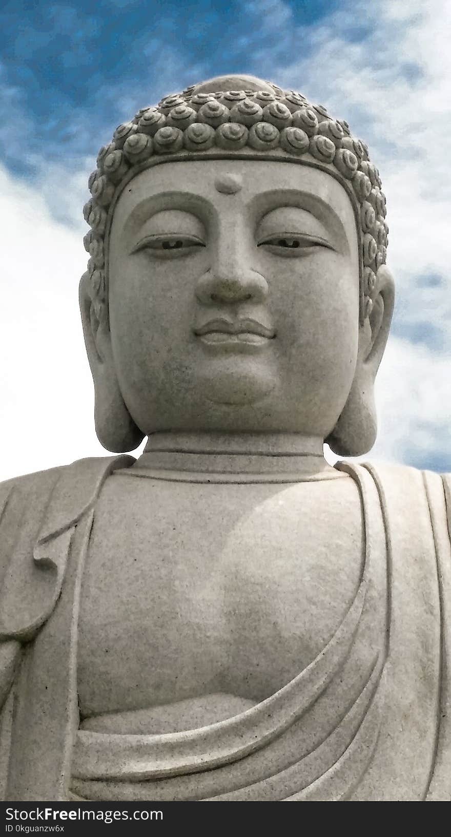 Buddha Statue Under White Clouds