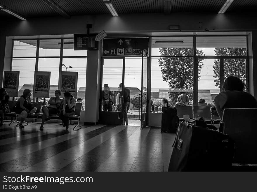 Group of People Indoors Grayscale Shot