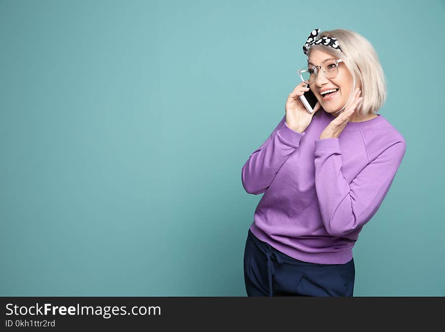 Mature woman talking on mobile phone