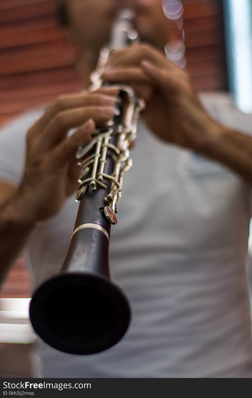 Young man playing the clarinet