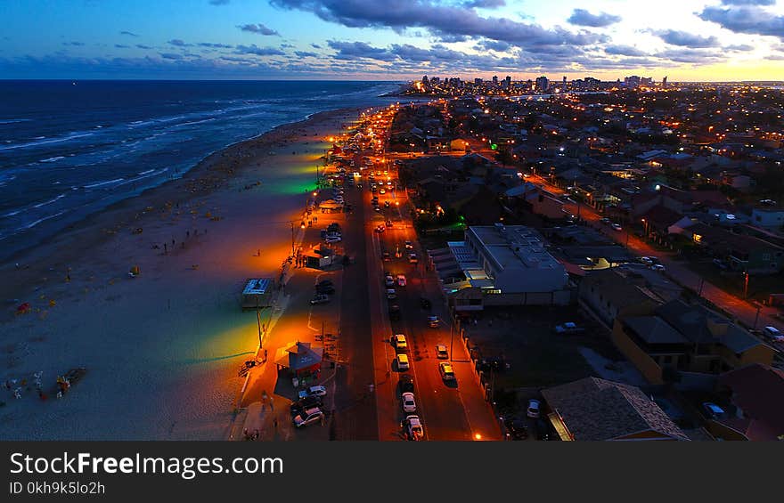 Aerial Photography of City and Seashore