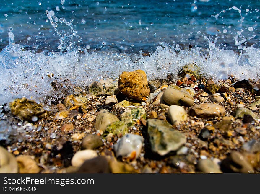 Close-Up Photography of Wet Rocks